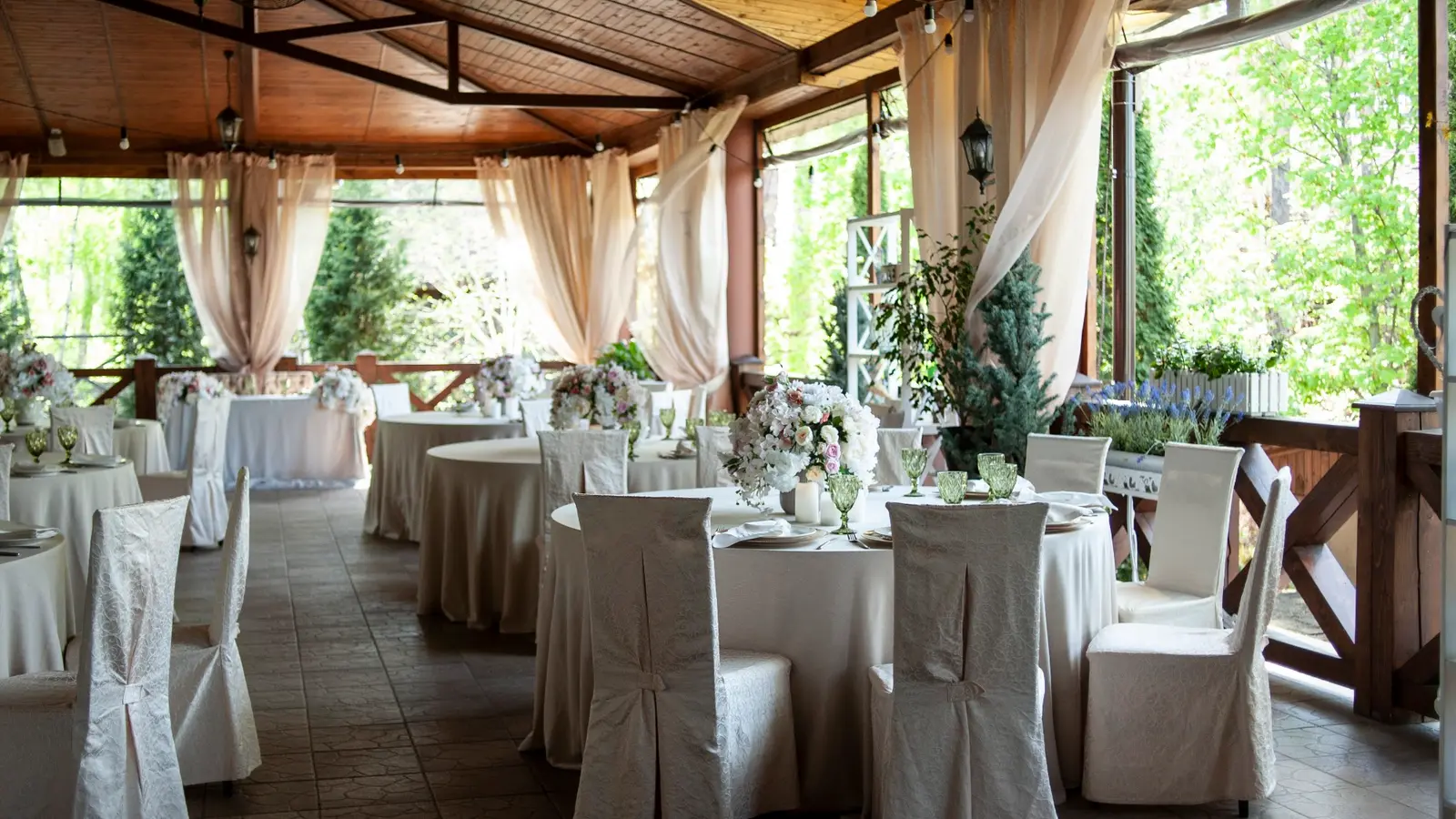 Banquet seating on the terrace with light drapes