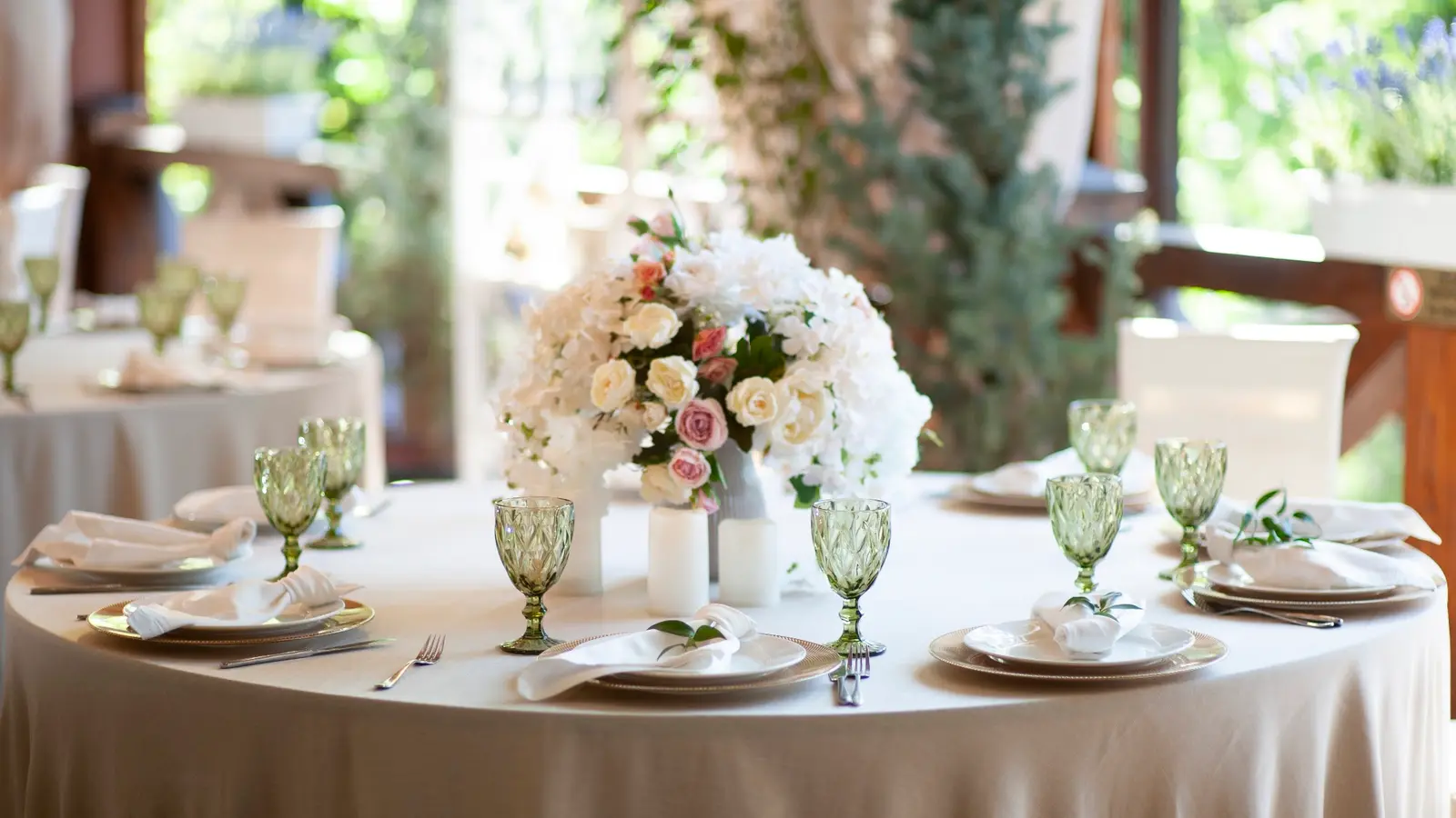 Flower arrangement and table setting on the terrace